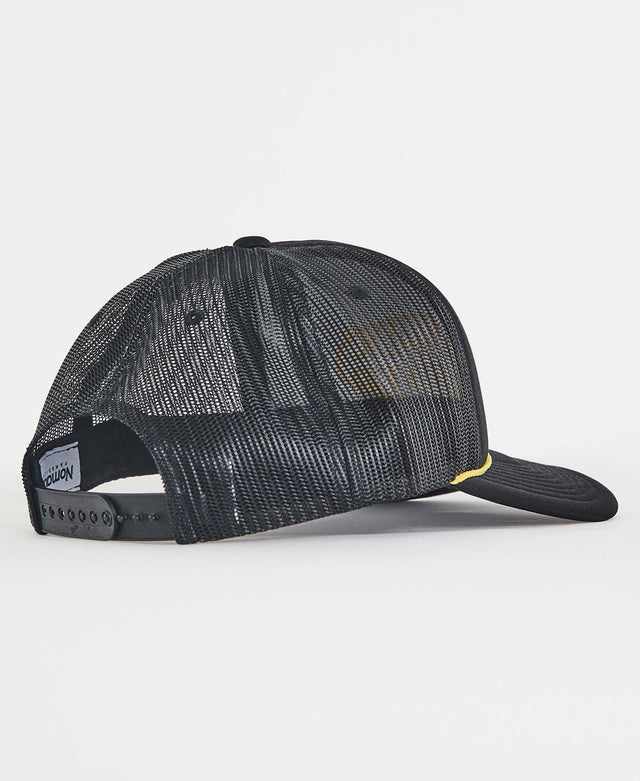 model wears Strand Trucker Cap Jet Black Headwear Black - image 3