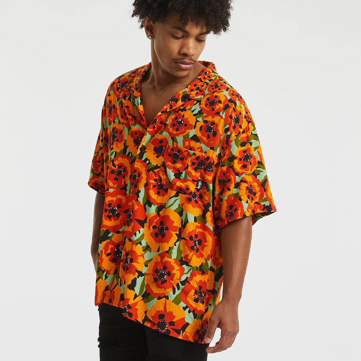 Stussy Poppy Short Sleeve Shirt in Orange Neverland Neverland