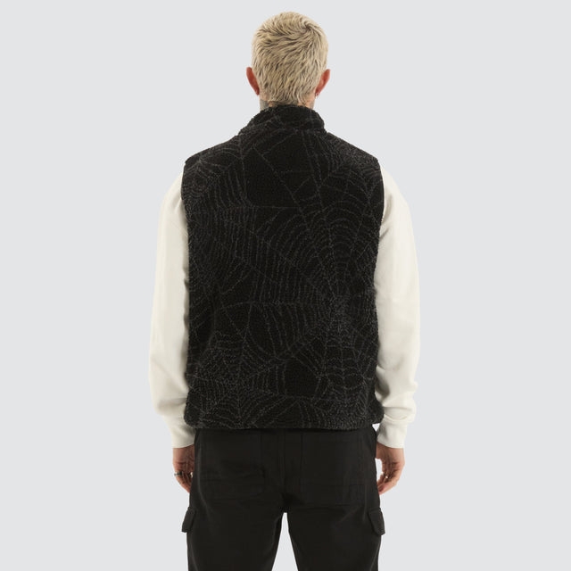 model wears Cobweb Reversible Vest Black Vests Black - image 4