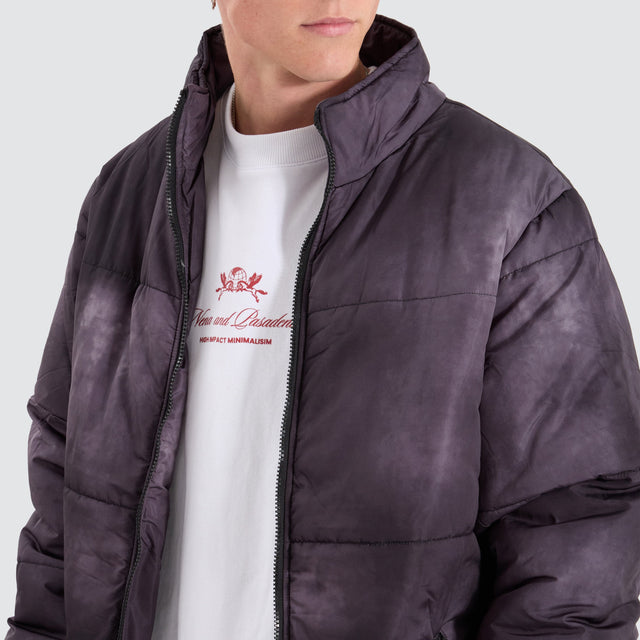 model wears Wave Dye Puffa Jacket Black Jackets Black - image 2