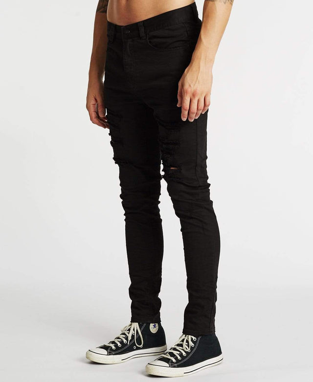 model wears K1 Super Skinny Fit Jeans Destroyed Black Pants Black - image 3