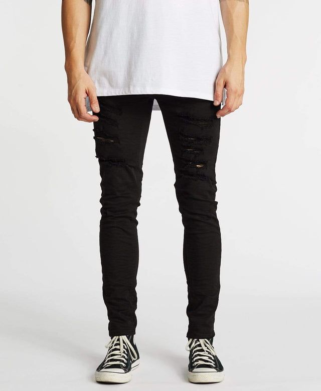 model wears K1 Super Skinny Fit Jeans Destroyed Black Pants Black - image 1