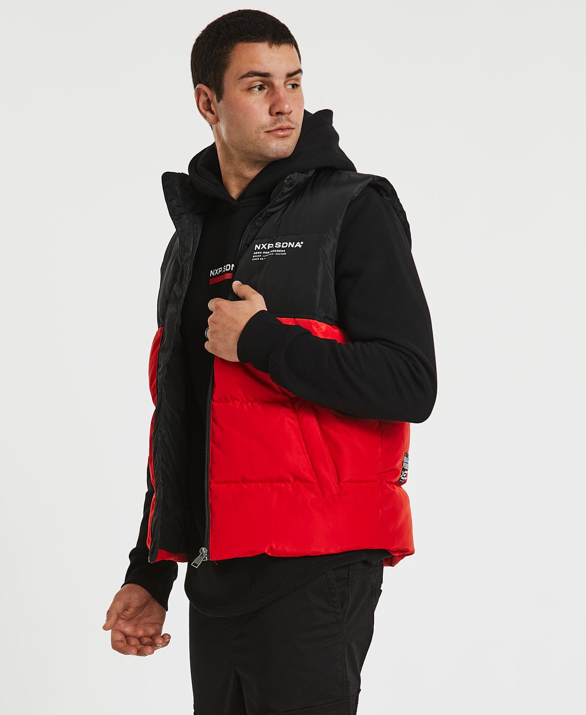 Red and black hot sale north face body warmer