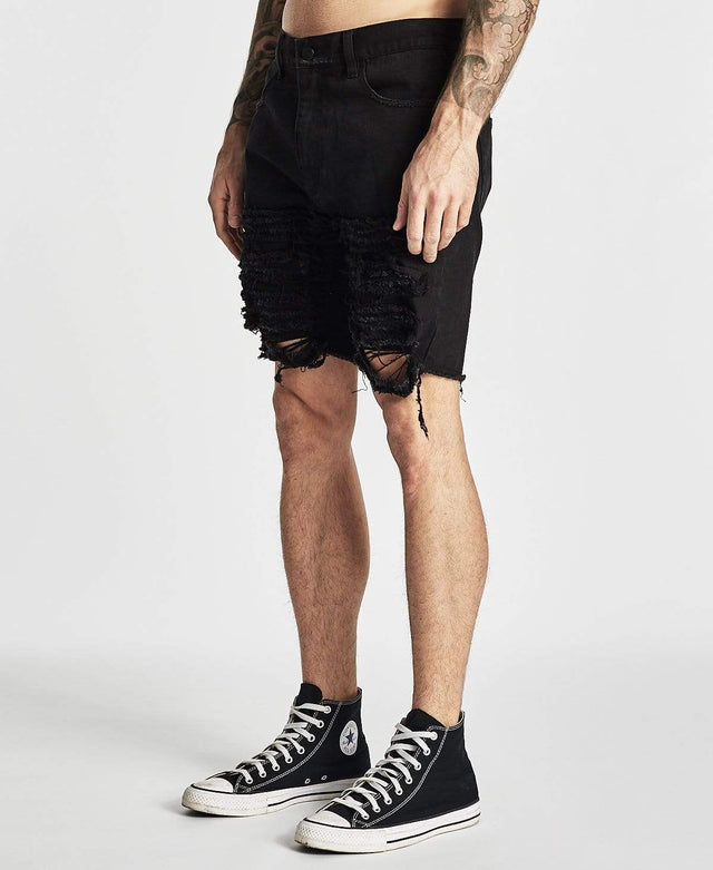 model wears Blade Runner Shorts Destroyed Black Shorts Black - image 4