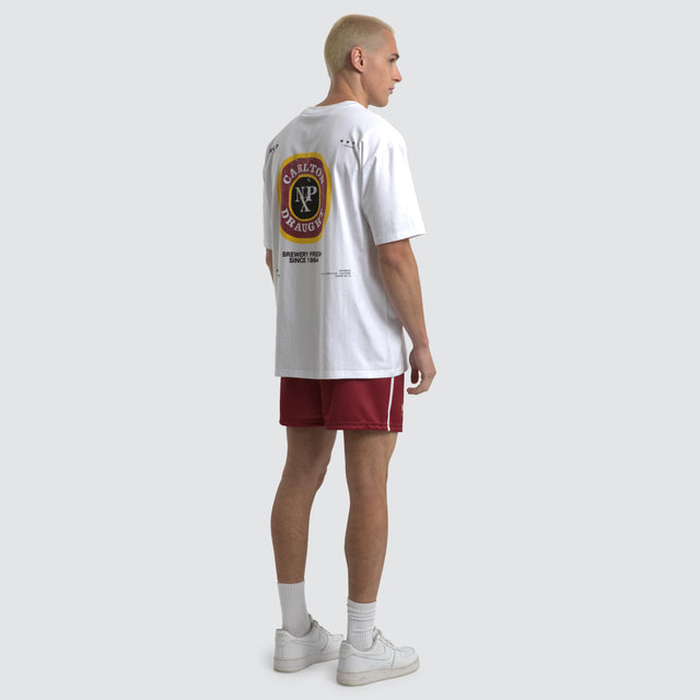 model wears Carlton Draught Centennial Box Fit Tee Optical White T-Shirts White - image 4