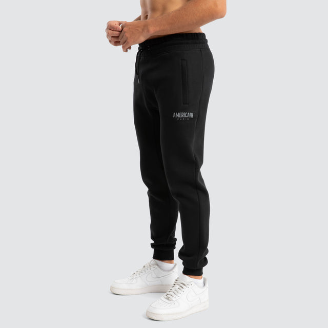 model wears Diversion Slim Trackpant Jet Black Trackpants Black - image 4