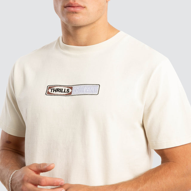 model wears Locked In Merch Fit Tee White T-Shirts Cream - image 3