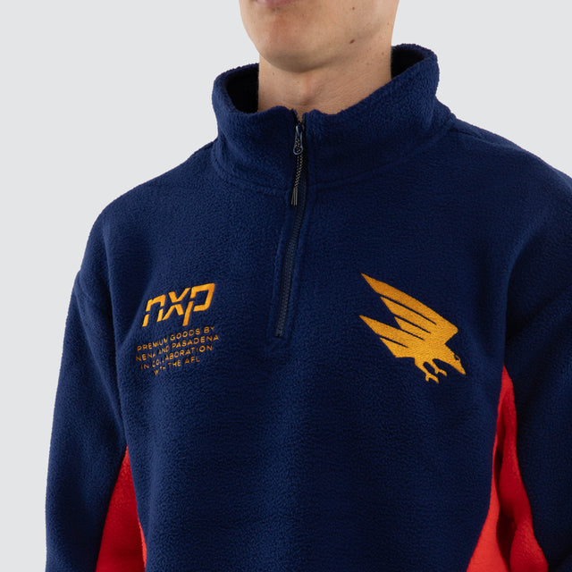 Model wears Adelaide Crows AFL Defence Pullover Navy/Red Jumpers Navy – image 4