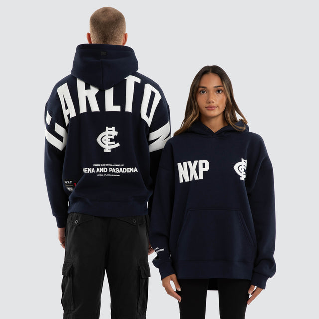 Model wears Carlton Blues AFL Top Tier Hoodie Navy Hoodies Navy – image 1