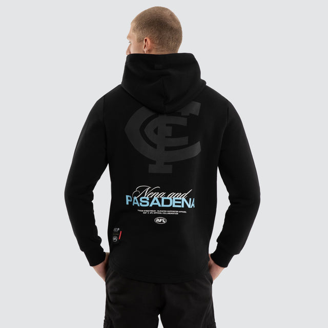 Model wears Carlton Blues AFL Recovery Hoodie Jet Black Hoodies Black – image 1