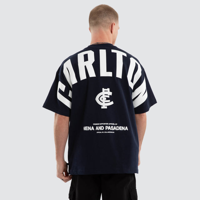 Model wears Carlton Blues AFL Archive Raptor Tee Navy T-Shirts Blue – image 1