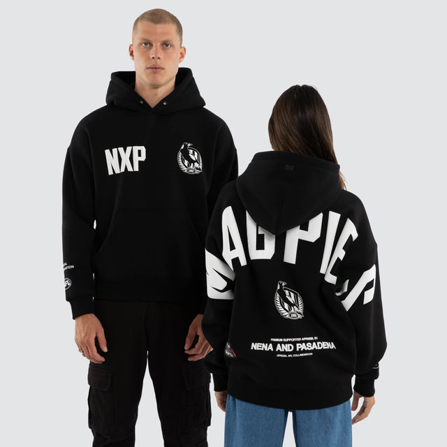 Model wears Collingwood Magpies AFL Top Tier Hoodie Jet Black Hoodies Black – image 1