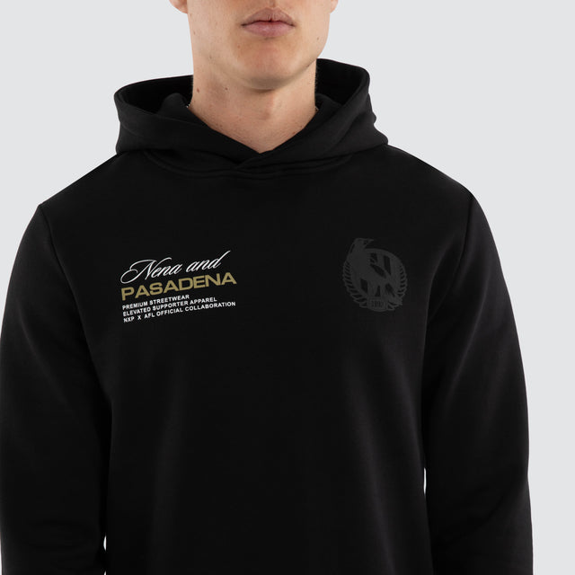 Model wears Collingwood Magpies AFL Recovery Hoodie Jet Black Hoodies Black – image 4