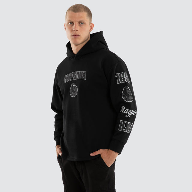 Model wears Collingwood Magpies AFL Simulation Hoodie Jet Black Hoodies Black – image 3