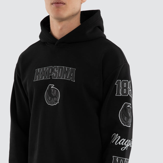 Model wears Collingwood Magpies AFL Simulation Hoodie Jet Black Hoodies Black – image 4