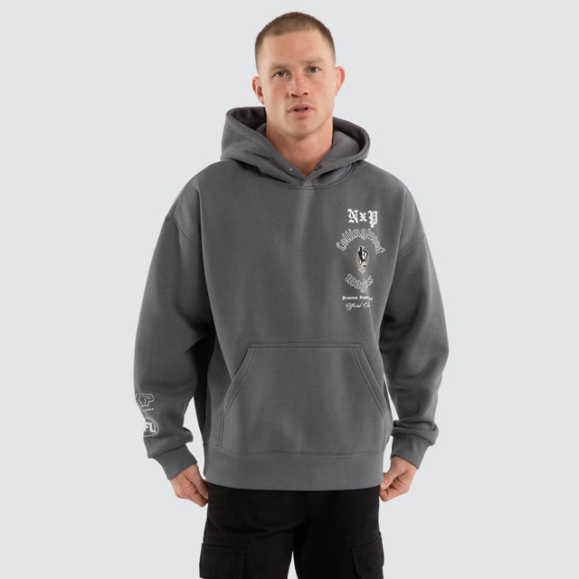 Model wears Collingwood Magpies AFL Tag Box Fit Hoodie Charcoal Hoodies Grey – image 7