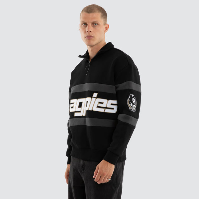 Model wears Collingwood Magpies AFL Allied Pullover Jet Black Jumpers Black – image 4