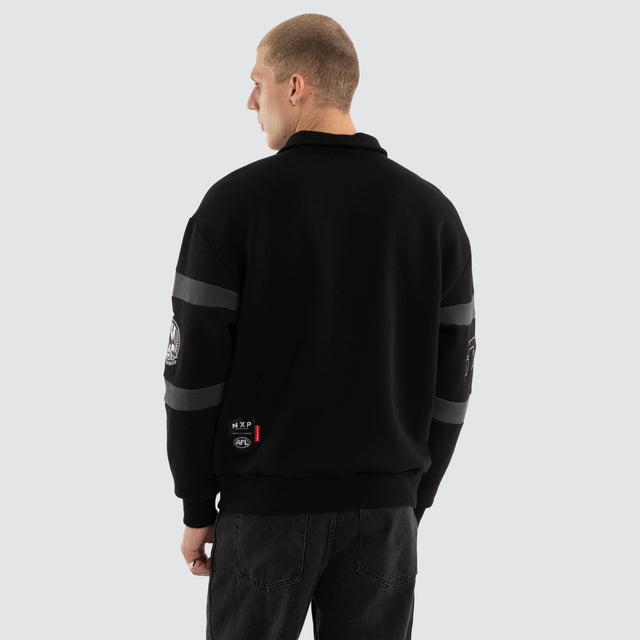 Model wears Collingwood Magpies AFL Allied Pullover Jet Black Jumpers Black – image 5
