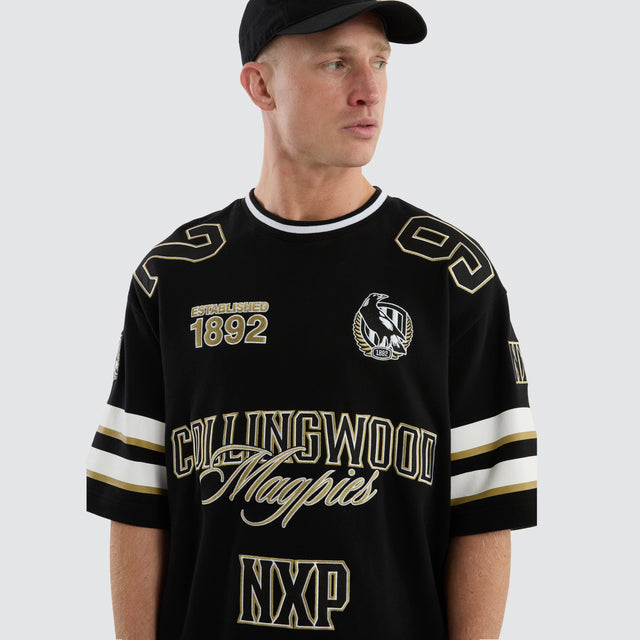 model wears Collingwood Magpies AFL League Loopback Tee Jet Black T-Shirts Black - image 7