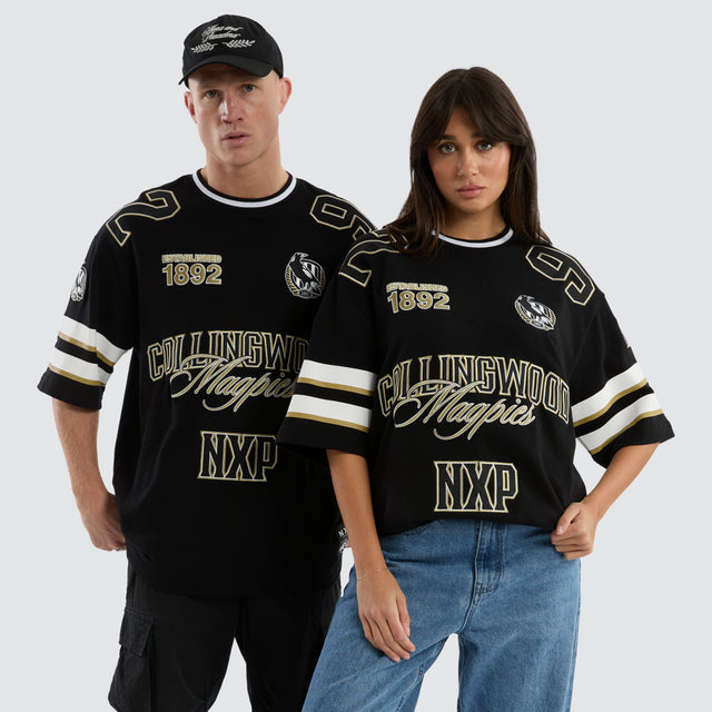 model wears Collingwood Magpies AFL League Loopback Tee Jet Black T-Shirts Black - image 1