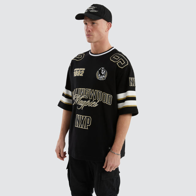 model wears Collingwood Magpies AFL League Loopback Tee Jet Black T-Shirts Black - image 4