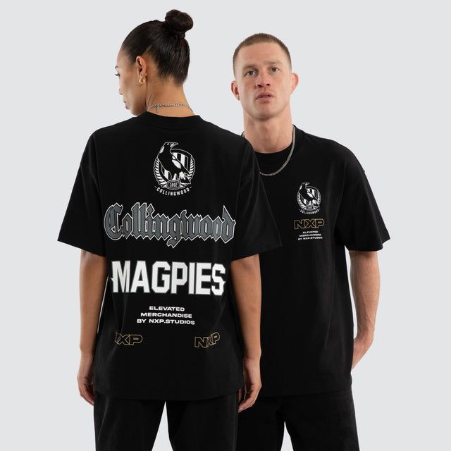 Model wears Collingwood Magpies AFL Sticker Raptor Tee Jet Black T-Shirts Black – image 1
