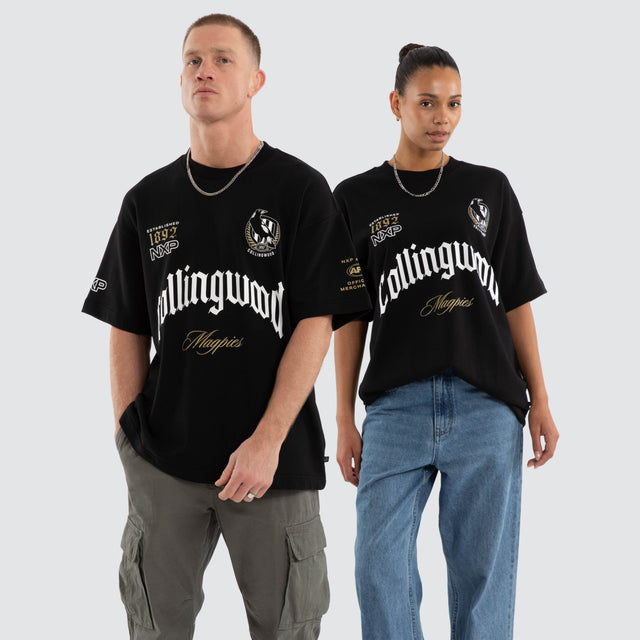 Model wears Collingwood Magpies AFL Gold Raptor Tee Jet Black T-Shirts Black – image 1