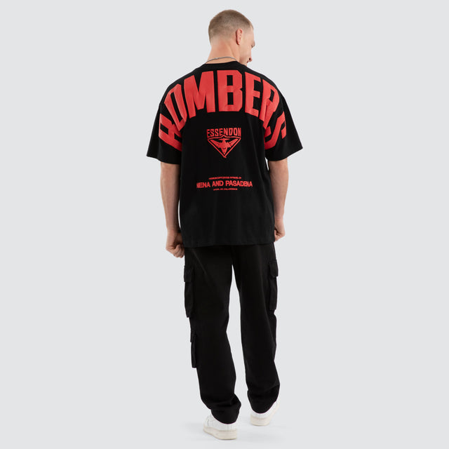 Model wears Essendon Bombers AFL Archive Raptor Tee Jet Black T-Shirts Black – image 7