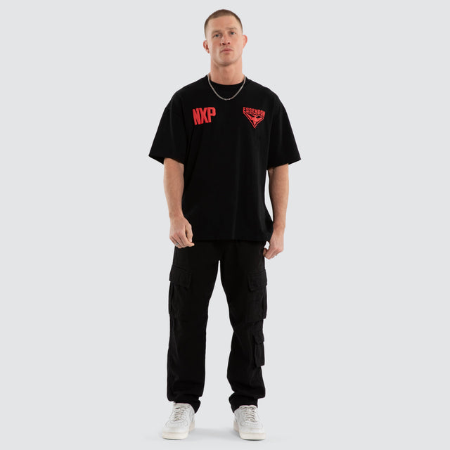 Model wears Essendon Bombers AFL Archive Raptor Tee Jet Black T-Shirts Black – image 2