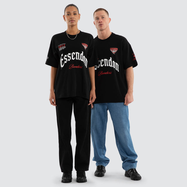 Model wears Essendon Bombers AFL Gold Raptor Tee Jet Black T-Shirts Black – image 3