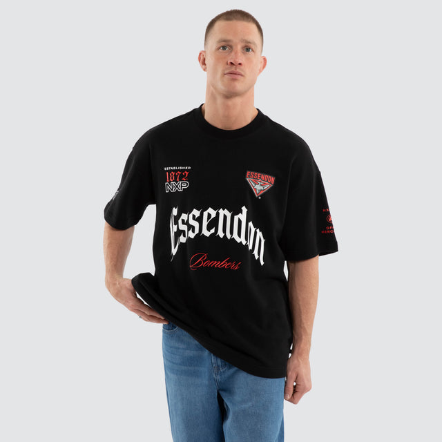 Model wears Essendon Bombers AFL Gold Raptor Tee Jet Black T-Shirts Black – image 5