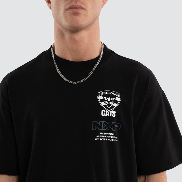 Model wears Geelong Cats AFL Sticker Raptor Tee Jet Black T-Shirts Black – image 5