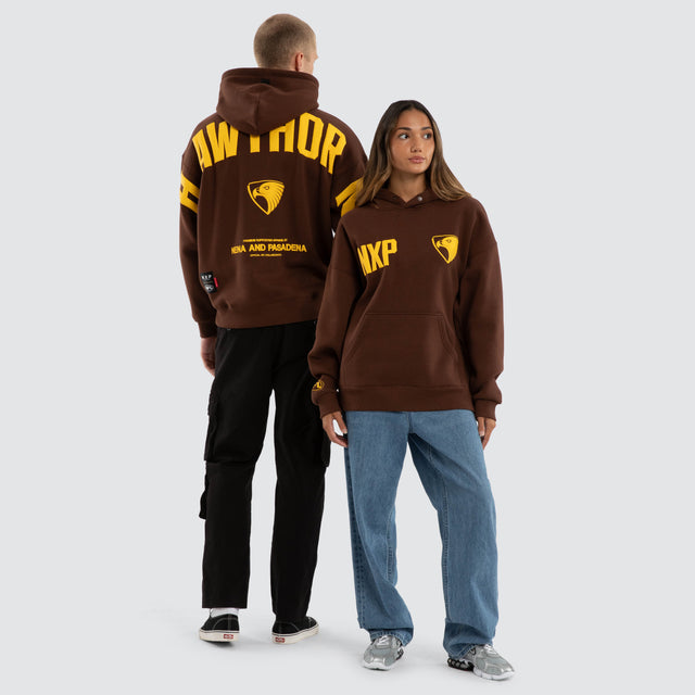 Model wears Hawthorn Hawks AFL Top Tier Hoodie Brown Hoodies Brown – image 3