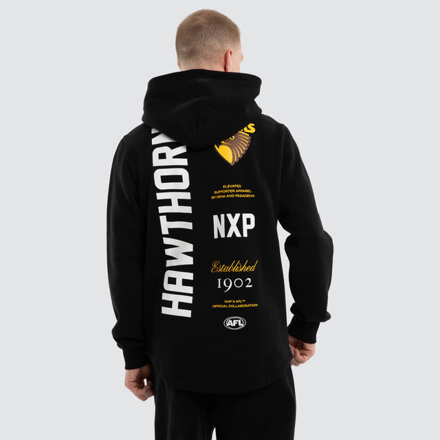 Model wears Hawthorn Hawks AFL Trophy Dual Curved Hoodie Jet Black Hoodies Black – image 1