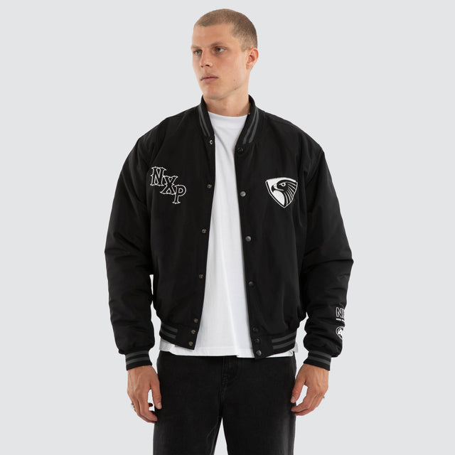 Model wears Hawthorn Hawks AFL Retro Bomber Jet Black Jackets Black – image 2