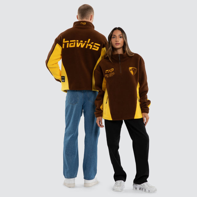 Model wears Hawthorn Hawks AFL Defence Pullover Brown/Yellow Jumpers Brown – image 3