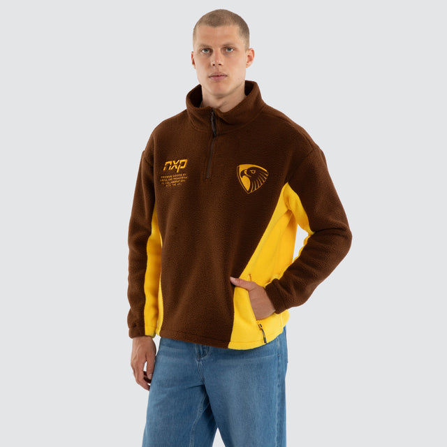 Model wears Hawthorn Hawks AFL Defence Pullover Brown/Yellow Jumpers Brown – image 5