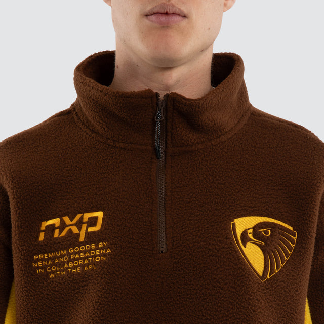 Model wears Hawthorn Hawks AFL Defence Pullover Brown/Yellow Jumpers Brown – image 4