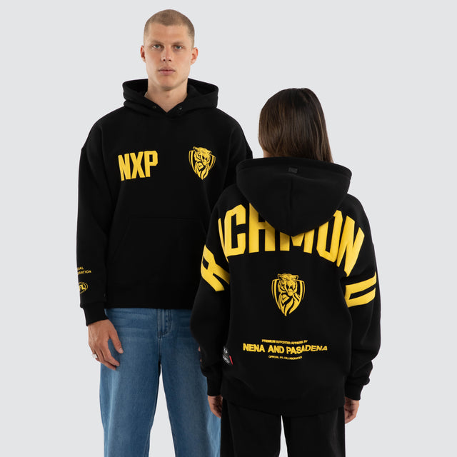 Model wears Richmond Tigers AFL Top Tier Hoodie Jet Black Hoodies Black – image 1