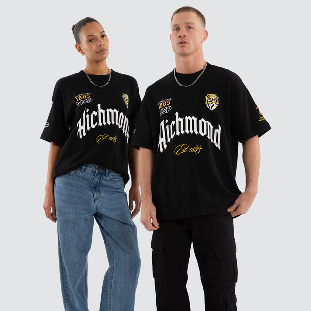 Model wears Richmond Tigers AFL Gold Raptor Tee Jet Black T-Shirts Black – image 1