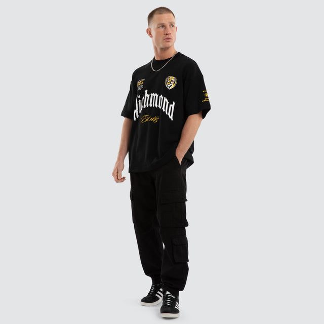 Model wears Richmond Tigers AFL Gold Raptor Tee Jet Black T-Shirts Black – image 4