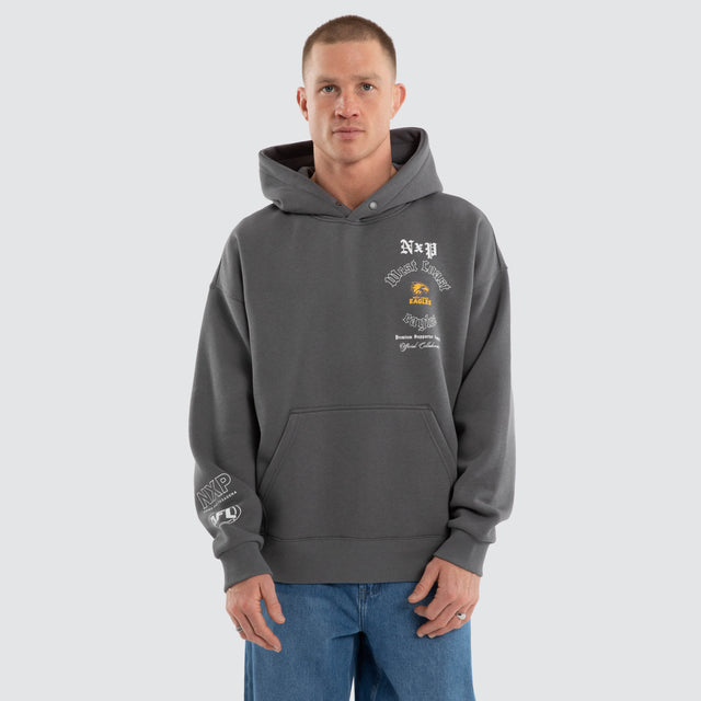 Model wears West Coast Eagles AFL Tag Box Fit Hoodie Charcoal Hoodies Grey – image 4