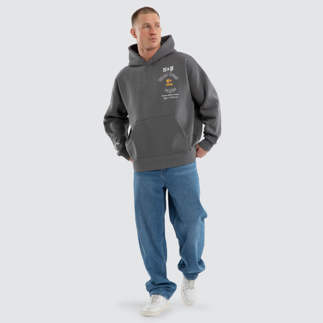 Model wears West Coast Eagles AFL Tag Box Fit Hoodie Charcoal Hoodies Grey – image 2