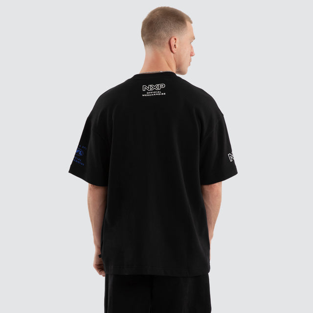 Model wears West Coast Eagles AFL Gold Raptor Tee Jet Black T-Shirts Black – image 6