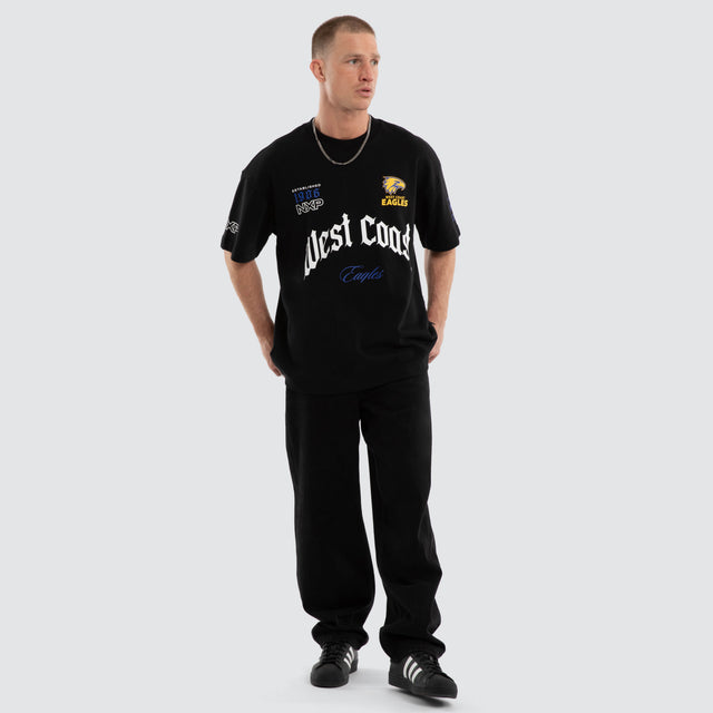 Model wears West Coast Eagles AFL Gold Raptor Tee Jet Black T-Shirts Black – image 7
