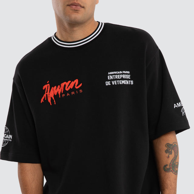 model wears National Oversized Tee Jet Black T-Shirts Black - image 5