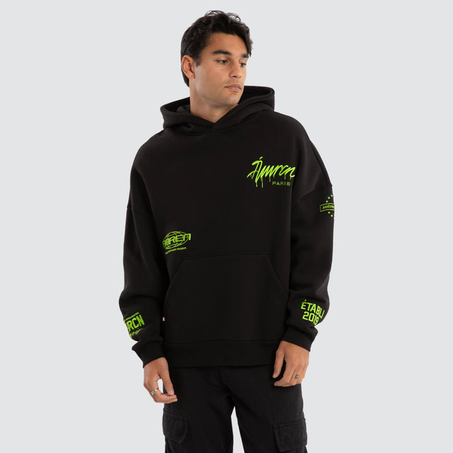 model wears Idol Relaxed Hoodie Jet Black Hoodies Black  - image 3