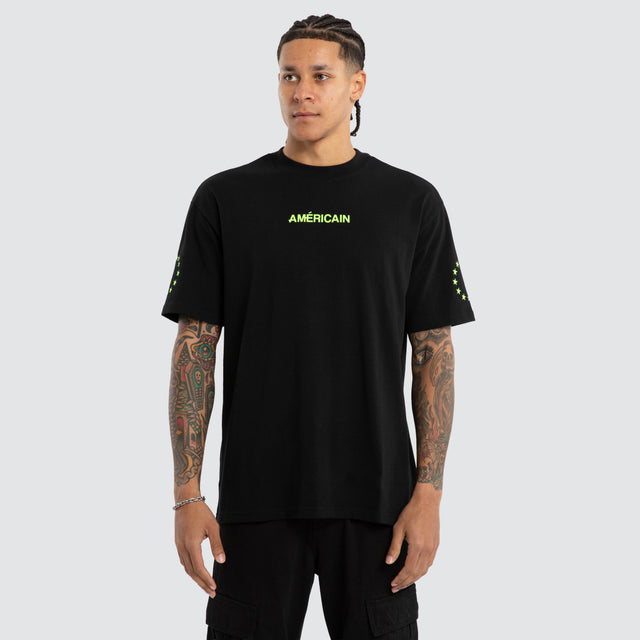 Model wears Echelon Box Fit Tee Jet Black/Green T-Shirts Black – image 3