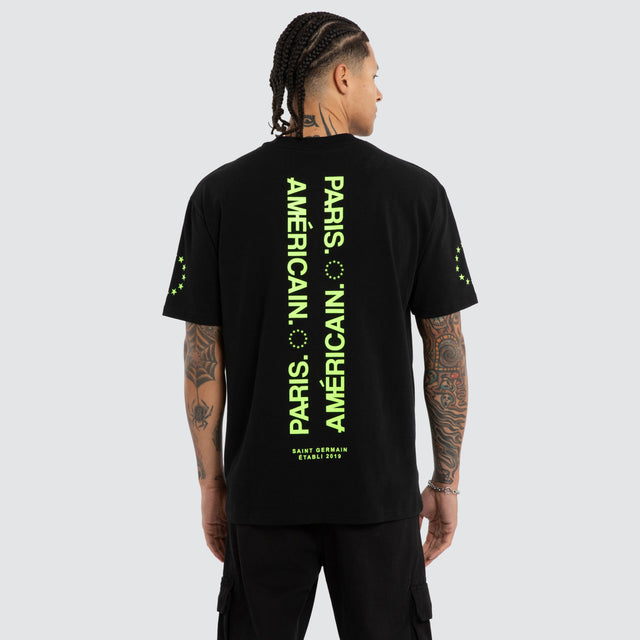 Model wears Echelon Box Fit Tee Jet Black/Green T-Shirts Black – image 1