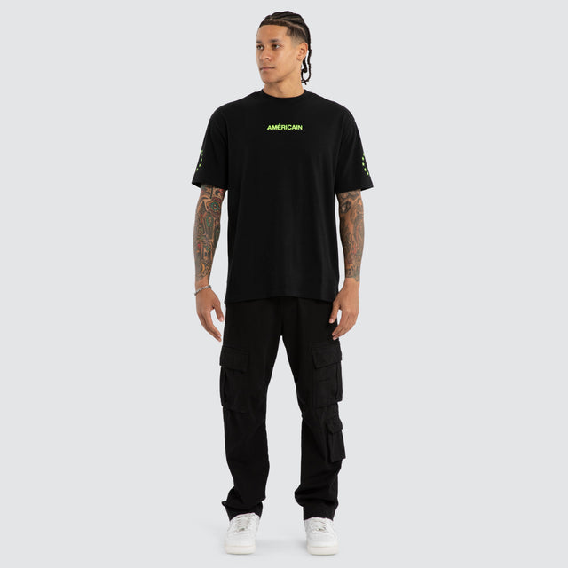 Model wears Echelon Box Fit Tee Jet Black/Green T-Shirts Black – image 5